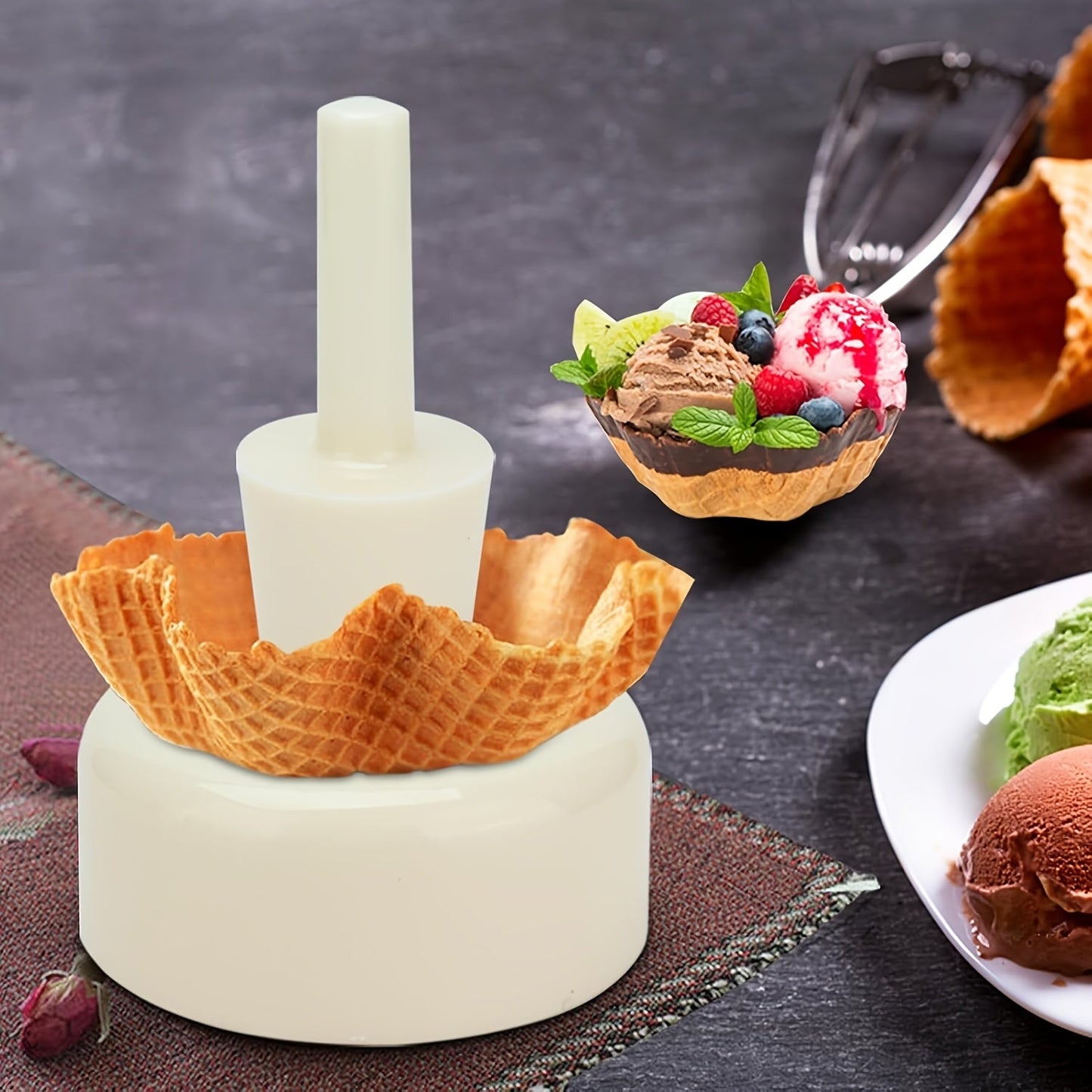 Make your own waffle cones at home with this set that includes a reusable ice cream cone and egg roll mold. This easy-to-use kitchen gadget is made of durable PP material and is perfect for cooking and baking.