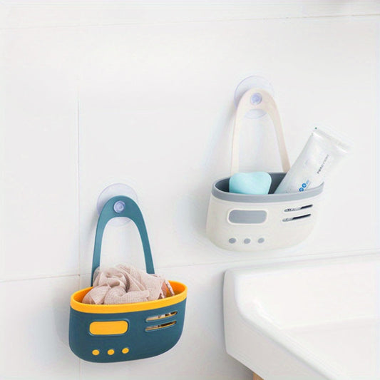 Sink basket with double-layer suction cups, made of plastic for kitchen storage. Hangs on the drain for organization without the need for wood or power. Ideal for use in home kitchens.