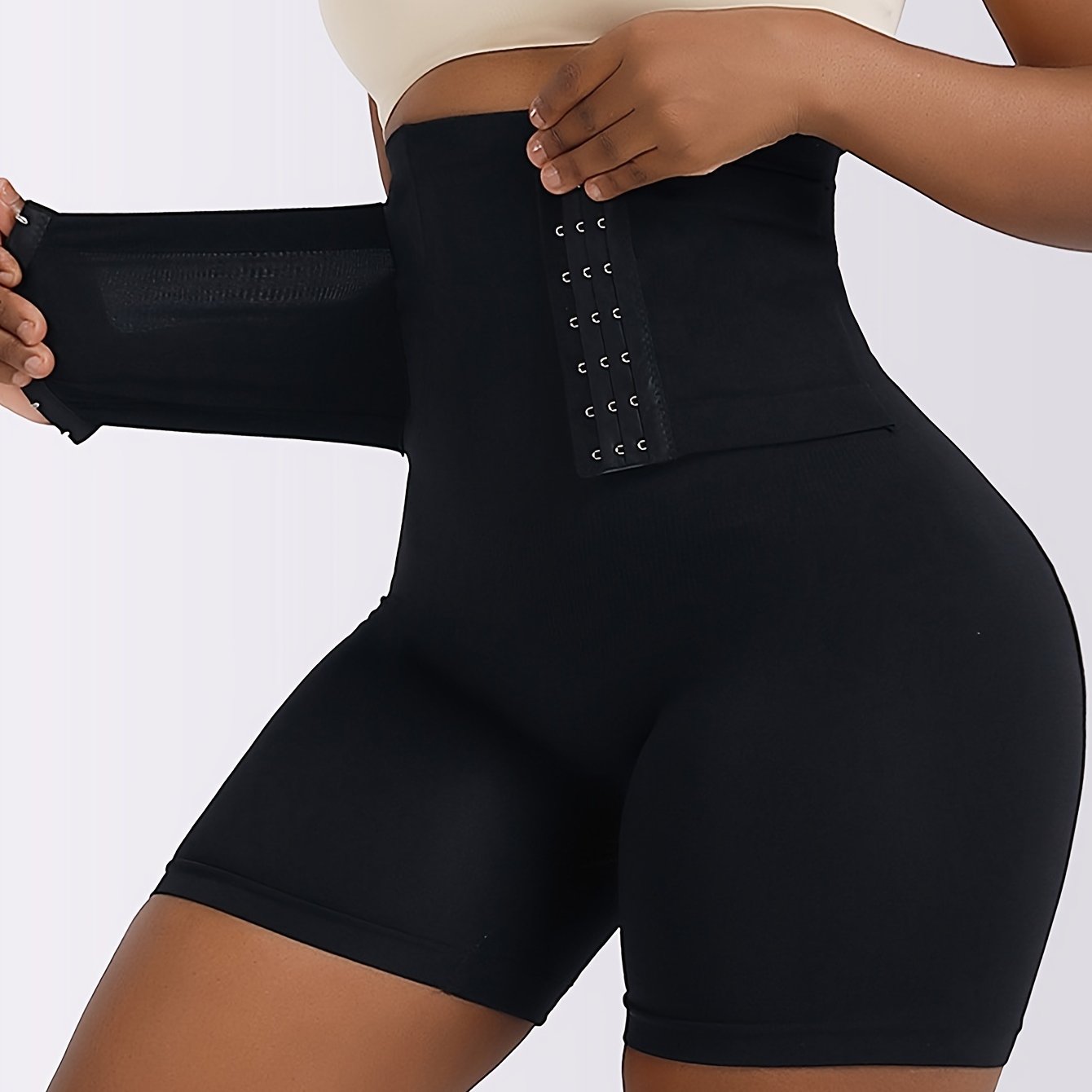 Women's high waist tummy control pants with adjustable front buckle and butt lifting feature for a slimmer waist and overall shaping.