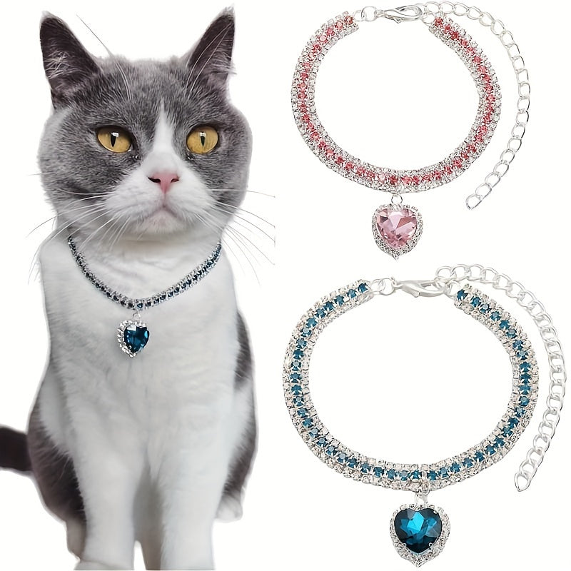 Colorful pet collar with crystal pendant for small pets, available in pink and blue.