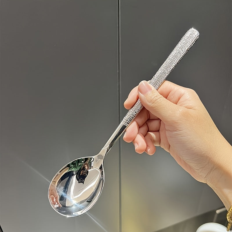 Durable stainless steel spoon with hammered round head design - ideal for kitchen and restaurant use. Easy to clean with a mirror polished finish. Suitable for soups, rice, and desserts.