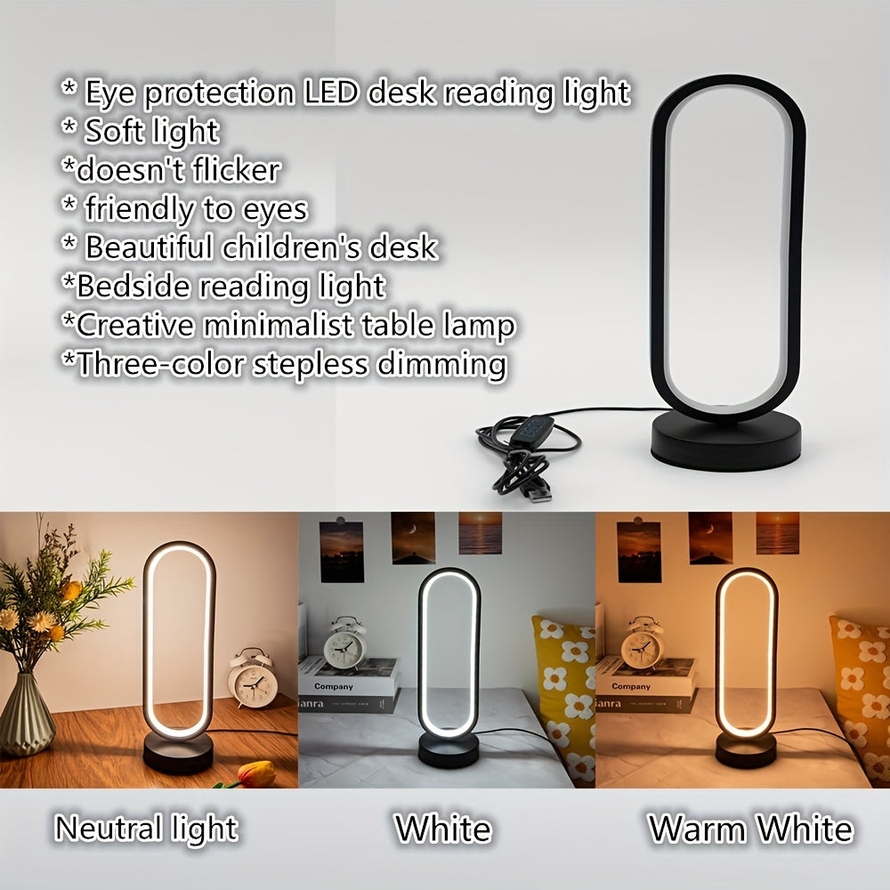 USB-powered LED ring table lamp in black or white; dimmable for bedroom and living room decor.