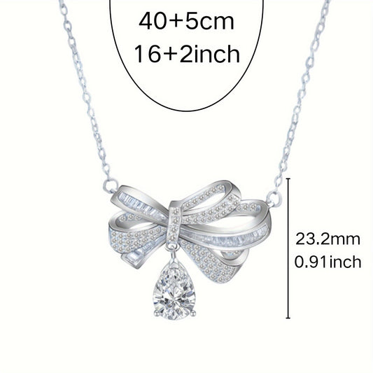 This elegant pendant necklace features 2.0 carats of moissanite in a teardrop tassel bow design, crafted in pure S925 silver. It is a high-end fashion accessory perfect for everyday wear, with its simple and elegant design suitable for parties and as a