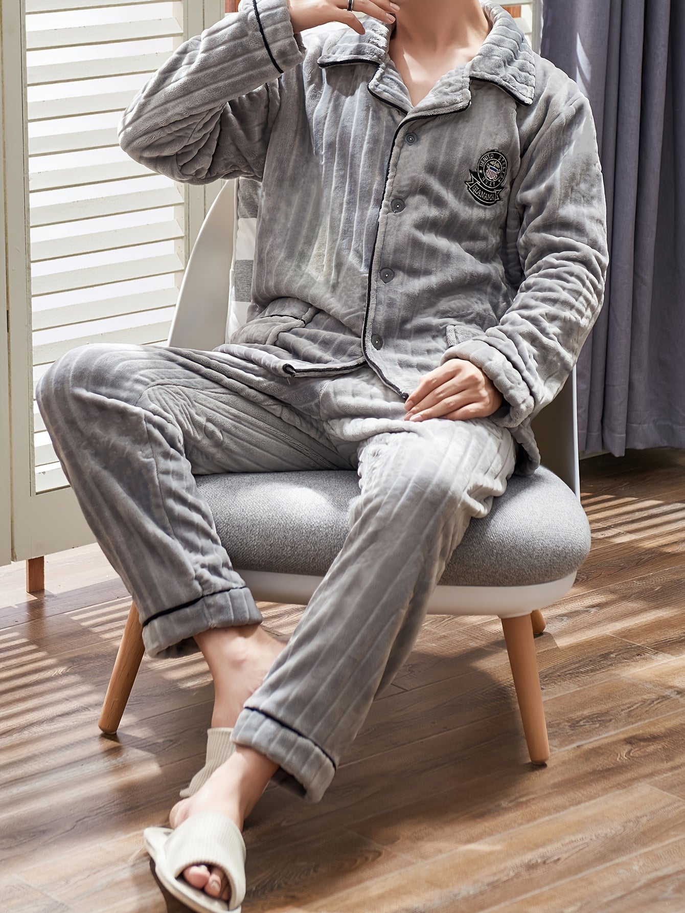 Autumn/Winter Flannel Pajama Set for Men featuring warm long sleeves and pants in thickened velvet fabric.