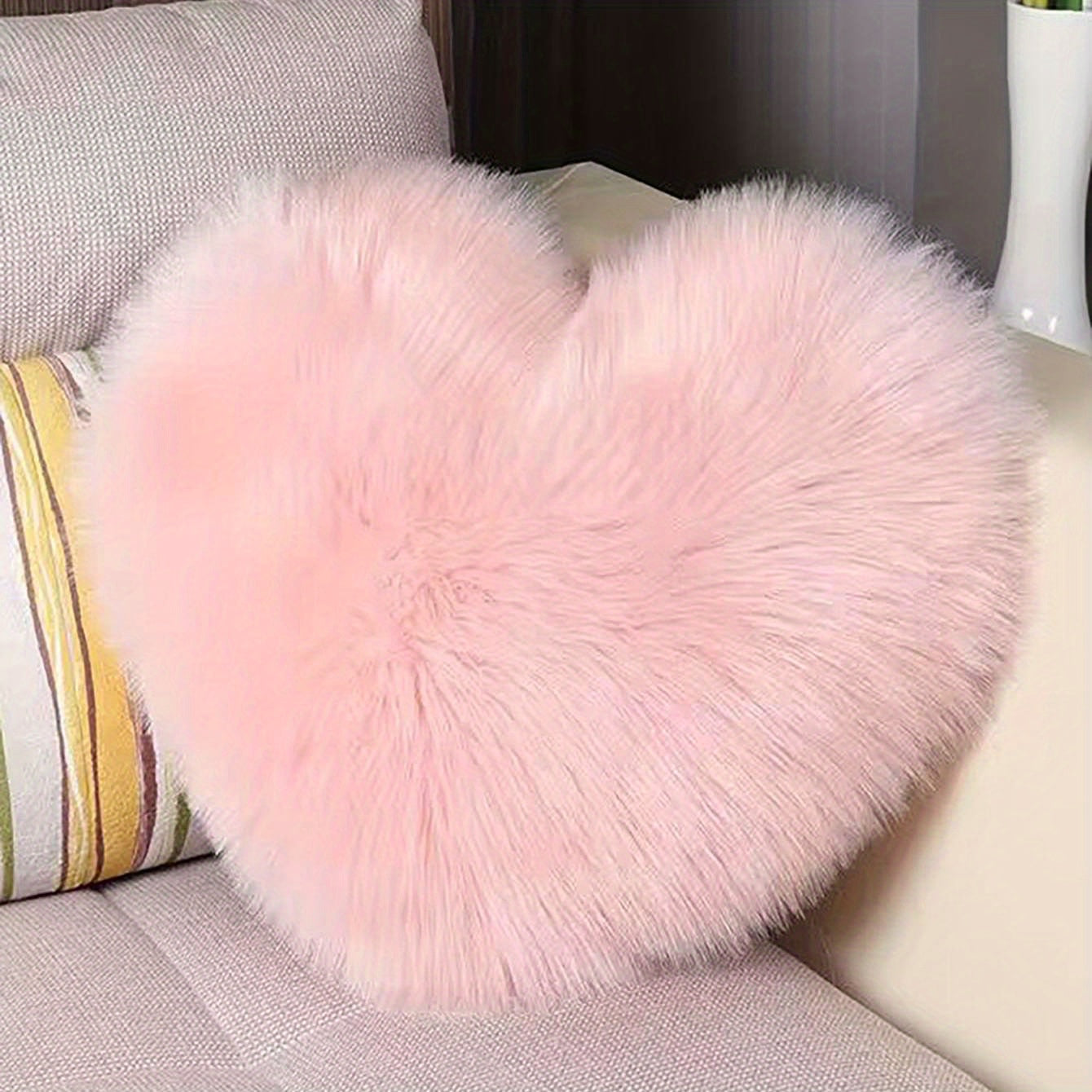 Soft and cozy pink heart pillowcase for living room, sofa, and bedroom, adding romance and comfort to your home decor.