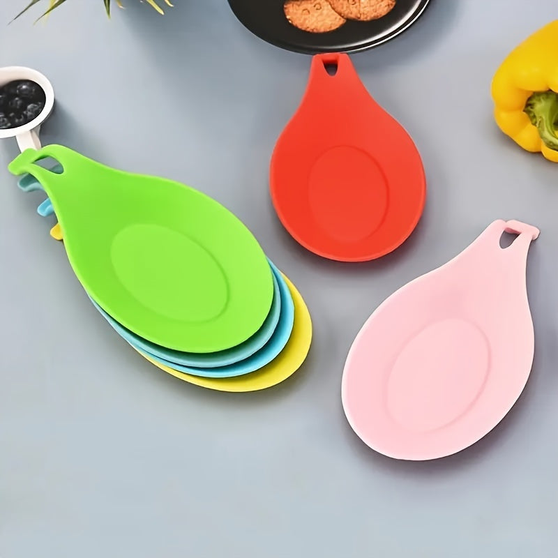 Silicone spoon rest for kitchen utensils - Easy to clean, heat-resistant holder for spoons and seasonings.