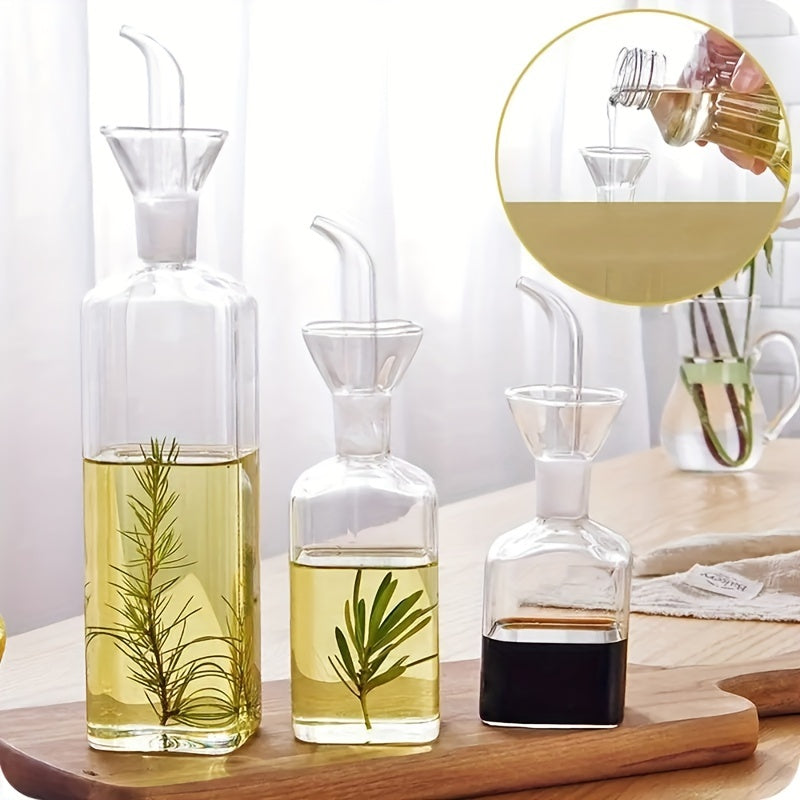 Transparent oil dispenser available in 5oz, 6.7oz, and 15.2oz sizes. This leakproof glass bottle is perfect for storing olive oil, vinegar, and other liquid seasonings. Suitable for cooking, baking, salad, and grilling. A must-have in your kitchen