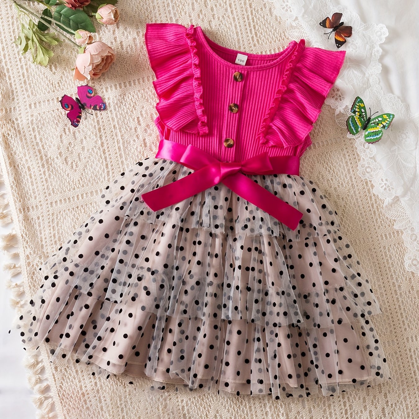 Elegant polka dot print tutu dress with button design for summer parties.