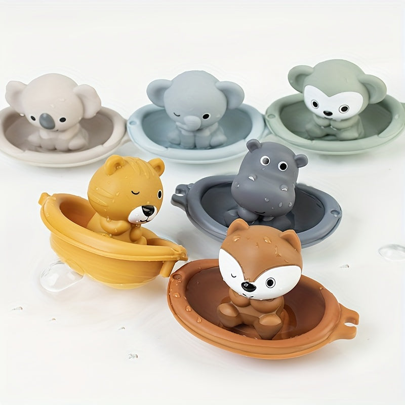 Floating boat toy for the bath, featuring animal finger covers for young children to play with in the water. Stackable and fun for youngsters.