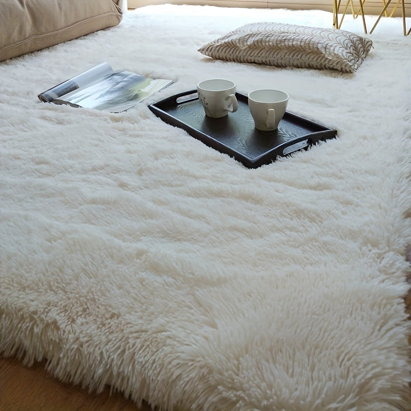 Soft shaggy area rug made of machine washable polyester fiber, featuring non-slip and stain-resistant properties. This cozy indoor carpet comes in a rectangle shape, covering less than 2.16m² and with a longest side under 1.8m. Perfect for living rooms