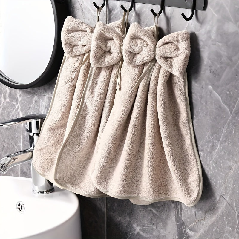 3-piece kitchen towel set with bowknot skirt pattern. Absorbent and quick-drying for household cleaning. Ideal kitchen essentials.