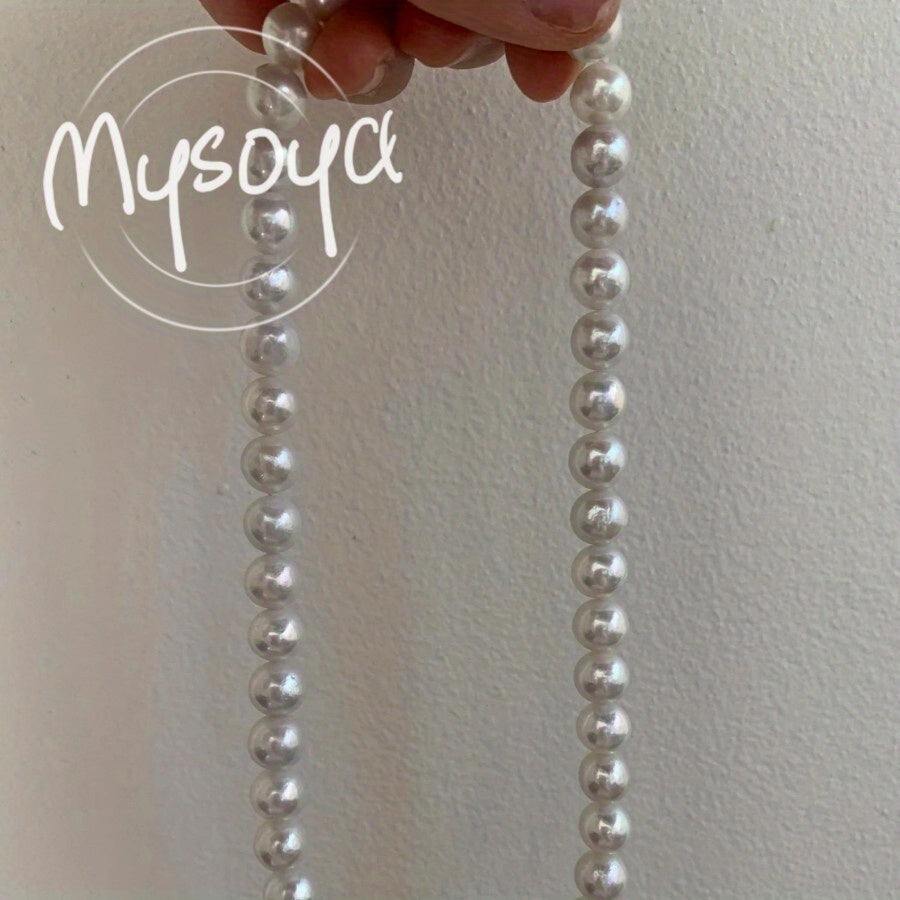 Elevate your style with the MYSOYA Elegant Large Natural White Pearl Necklace, featuring stunning 9-10mm pearls. This necklace comes in an exquisite gift box, making it perfect for any occasion - from daily wear to parties, birthdays, anniversaries