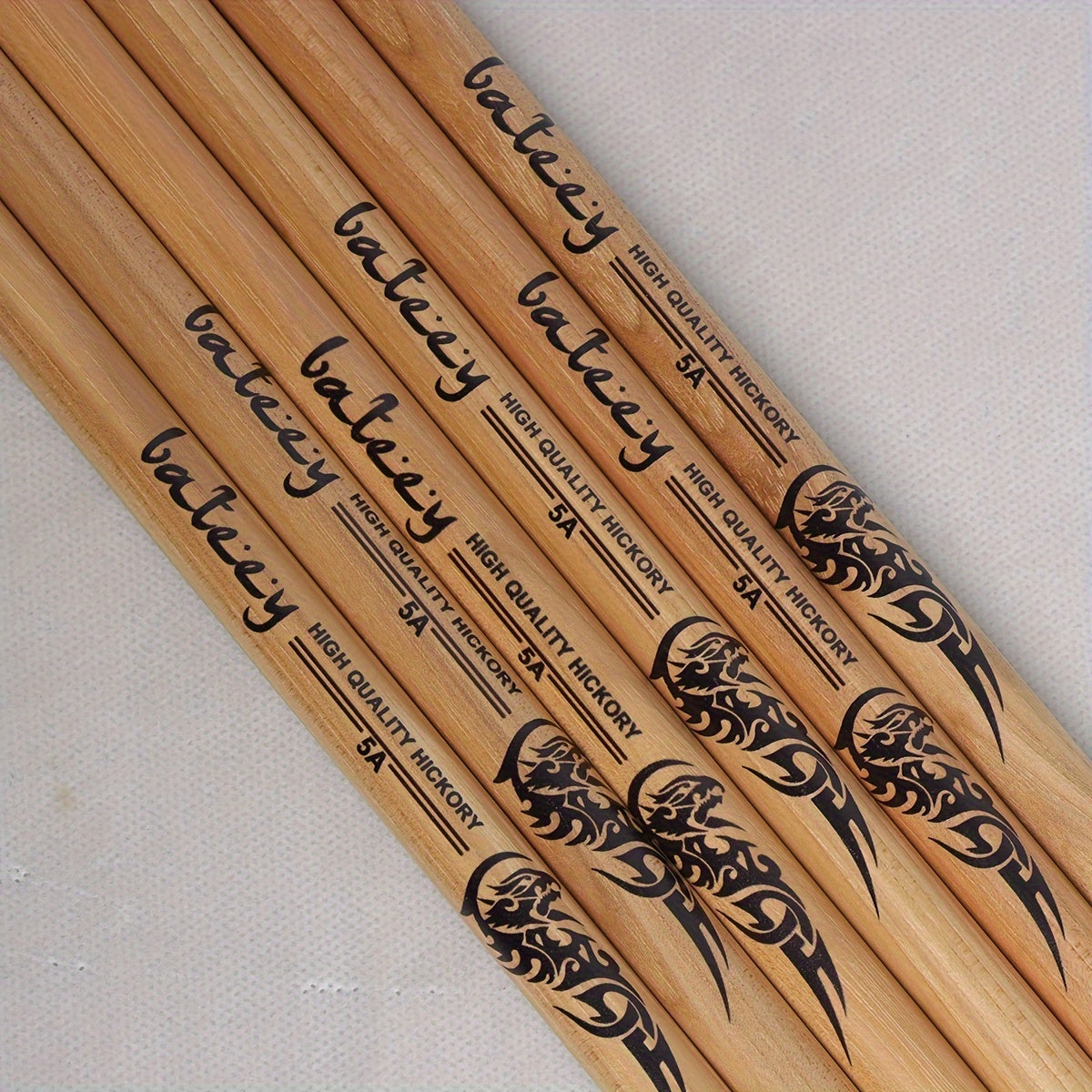 North American walnut drumsticks available in 5A, 5B, and 7A models for performance and practice.