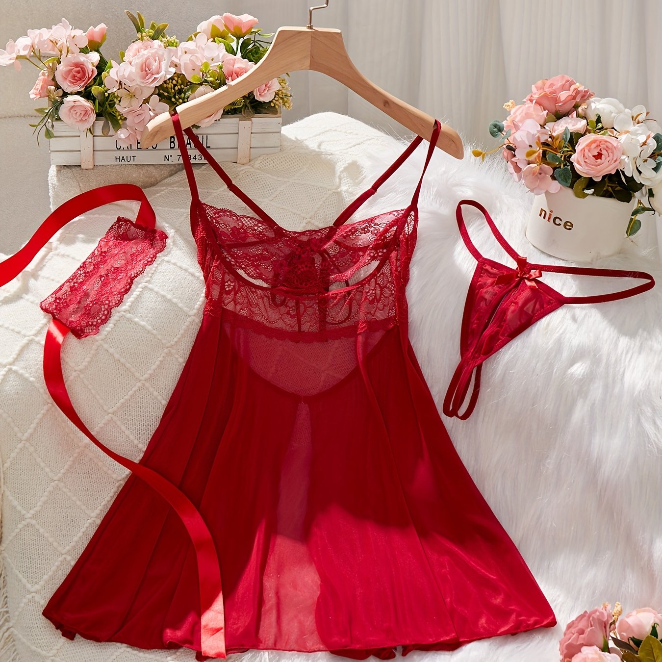 Red lingerie set featuring babydoll dress, G-string panty, eye mask, lace detail, satin ribbon accents - perfect for seductive boudoir attire.