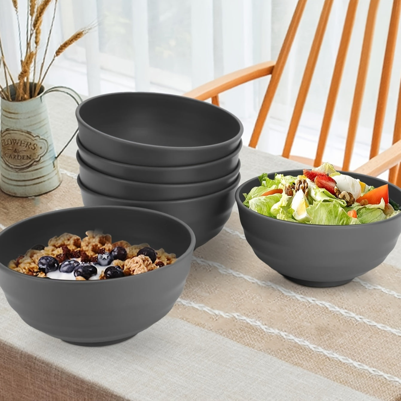 Durable plastic bowls safe for microwave use, perfect for meals at home or on-the-go. Offered in sets of 2, 4, or 6.