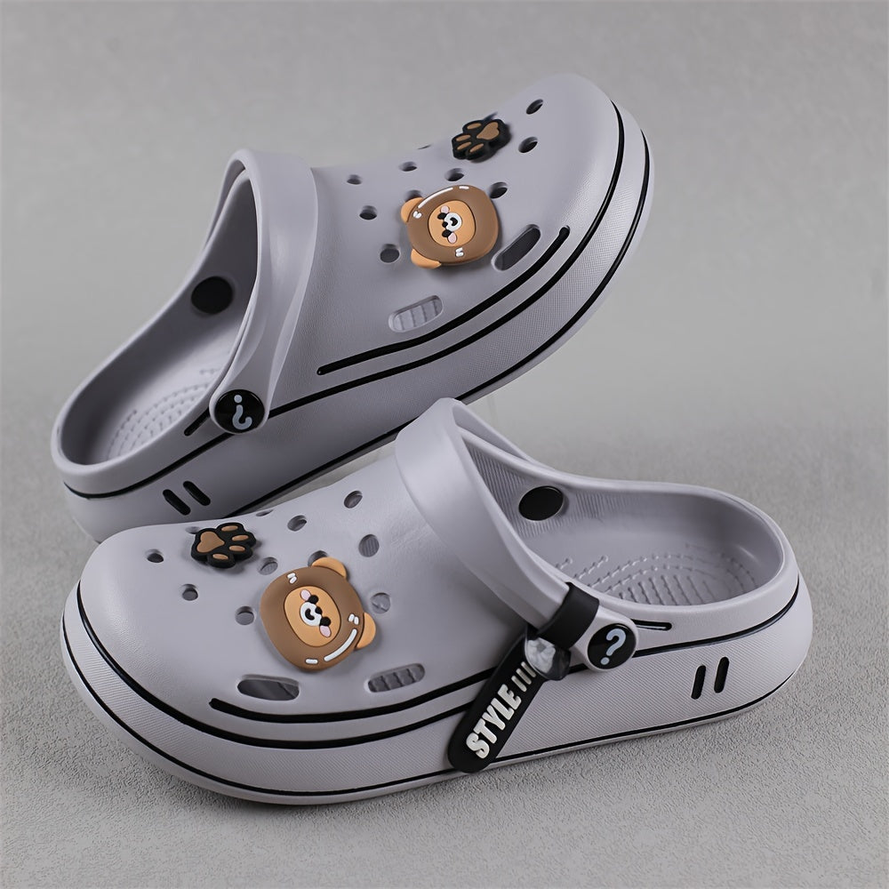 Durable outdoor slippers for boys featuring cartoon theme and comfy sole.