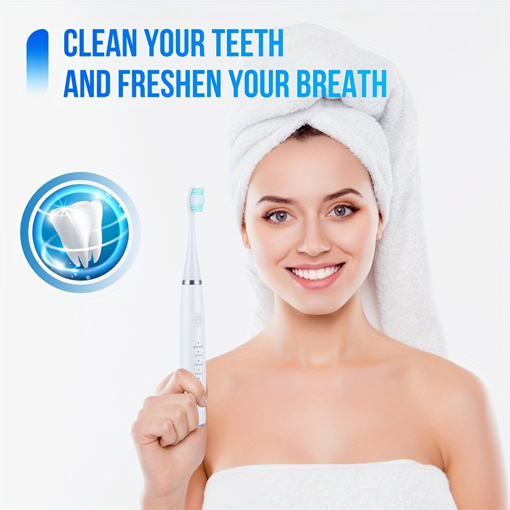 Portable six-in-one electric toothbrush kit with gentle brush head and teeth scaling beauty tool for easy use and personalized smile perfection.