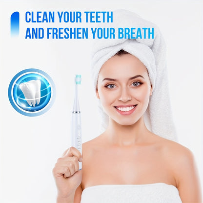 Portable six-in-one electric toothbrush kit with gentle brush head and teeth scaling beauty tool for easy use and personalized smile perfection.