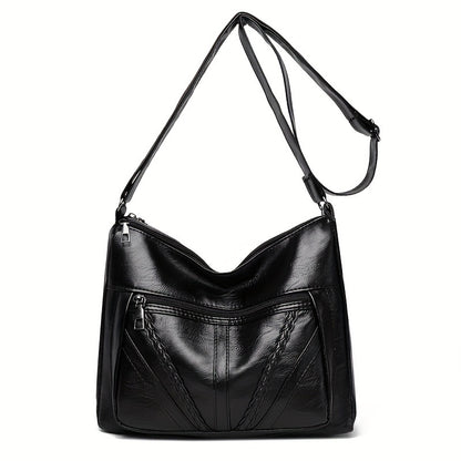 Large capacity crossbody purse with zipper closure for women's fashion.