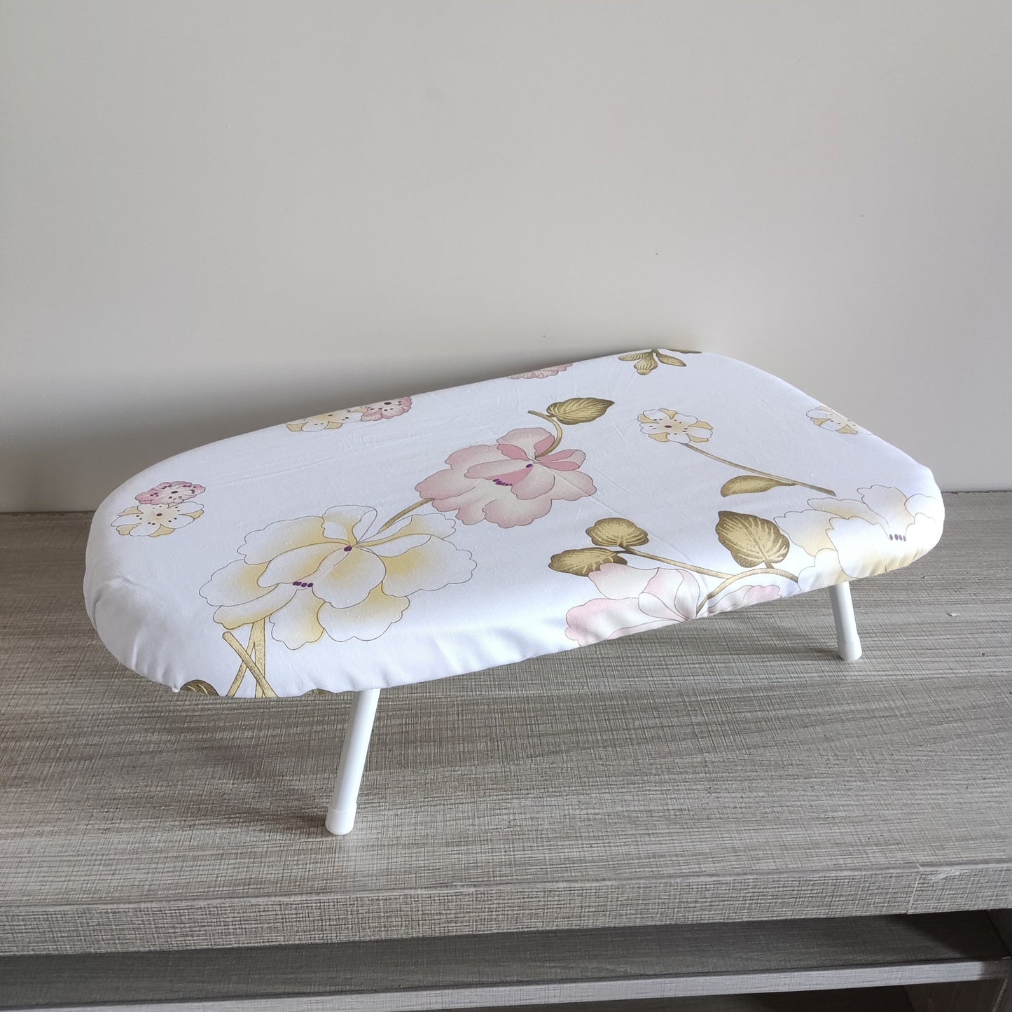 Compact Floral Design Ironing Board, Foldable Tabletop Clothes Pressing Pad, Sturdy Plastic Material, Secure Base, Convenient Space-Saving Option