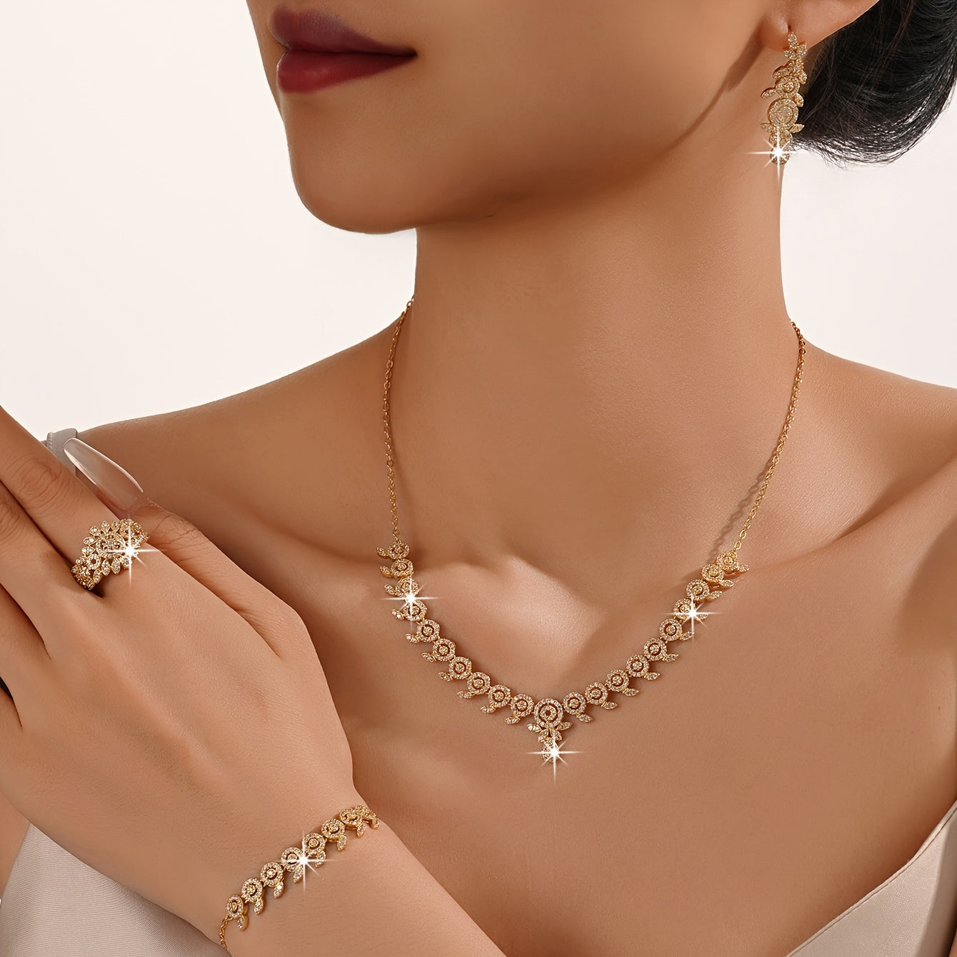 Luxurious Floral Jewelry Set featuring 5 pieces, made with 18K Gold Plated Copper, adorned with Synthetic Zirconia stones in a Leaf and Teardrop design. This set includes a Necklace, Bracelet, Earrings, and an Adjustable Ring, perfect for Women to wear