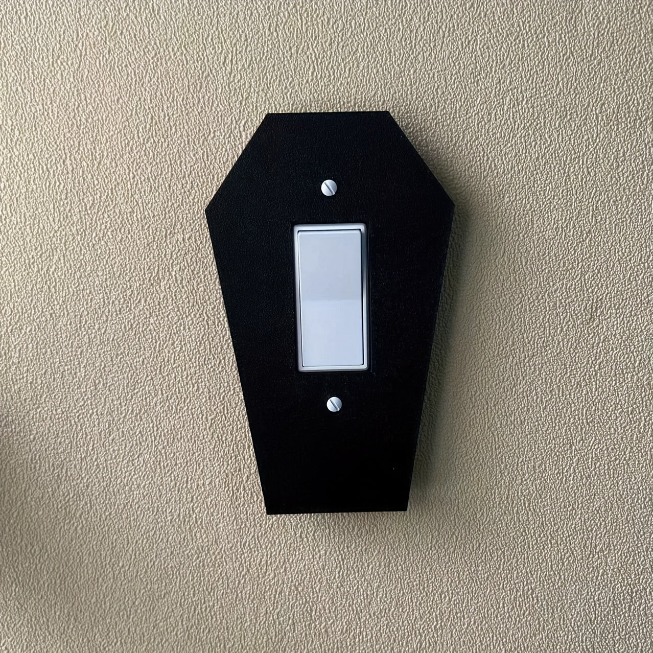 Gothic tombstone wall light with classic black design for easy installation in homes and offices.