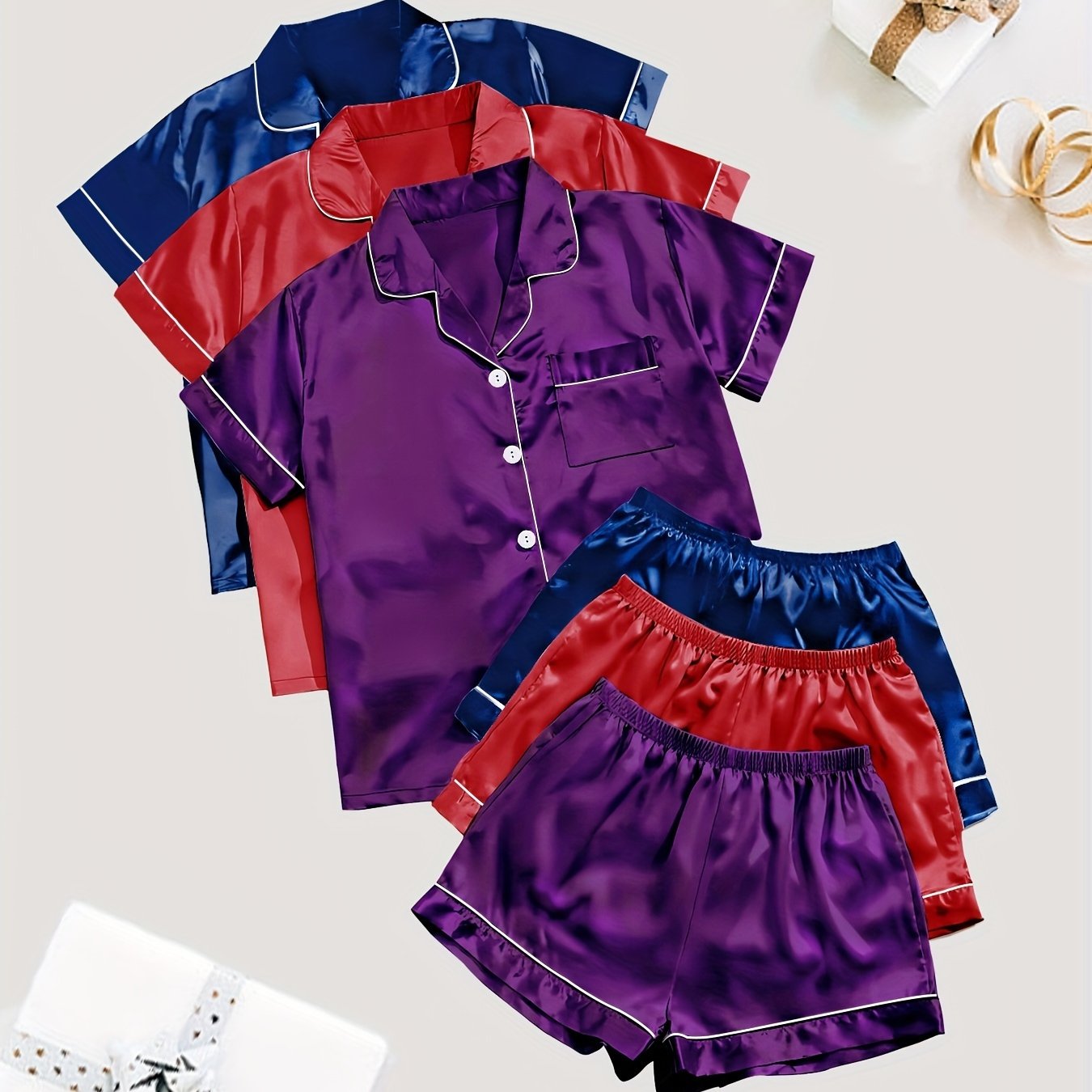 Solid satin pajamas with short sleeve button top and elastic shorts for women's sleepwear.