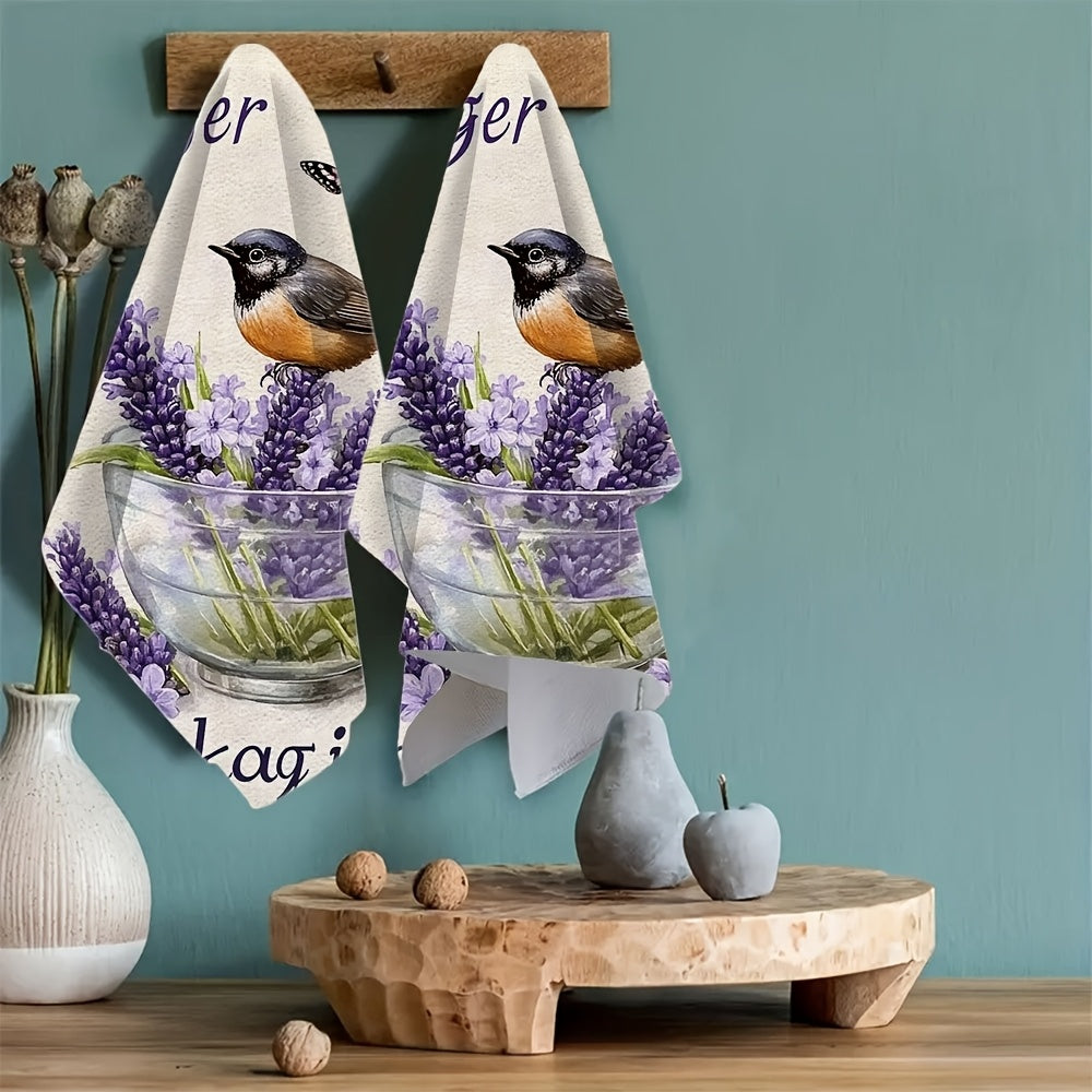 Pair of ultra-soft lavender kitchen towels adorned with birds and butterflies in purple hues. These highly absorbent towels are perfect for holiday decor and are machine washable. Each towel measures 40.64x60.96 cm.