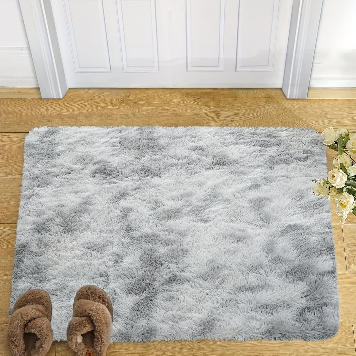 Indulge in comfort and style with this plush faux fur area rug, perfect for your living room or bedroom. Made from soft polyester, this fluffy carpet is non-slip and easy to care for with dry cleaning. Add a touch of luxury to your home decor with this