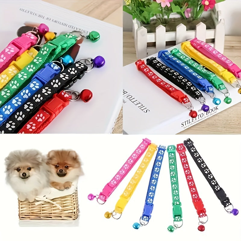 10 adjustable nylon pet collars with bells featuring vibrant cartoon paw & footprint design for dogs and cats