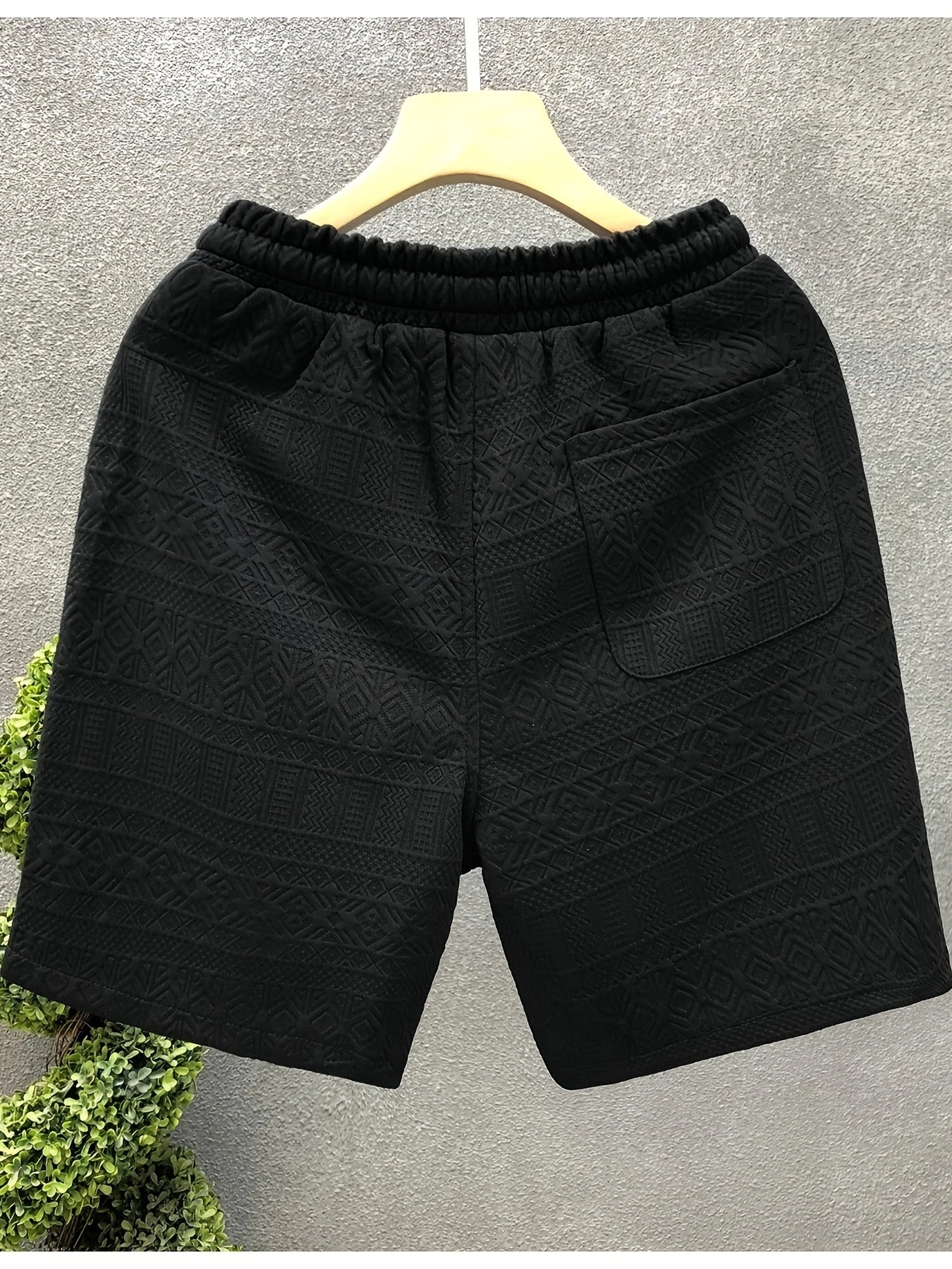 Breathable polyester blend drawstring shorts for men, ideal for summer outings and hiking.