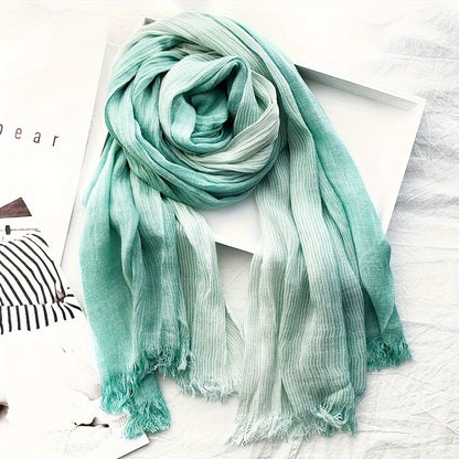 Elegance meets simplicity with our Classic Striped Tassel Scarf, the perfect fashion accessory.