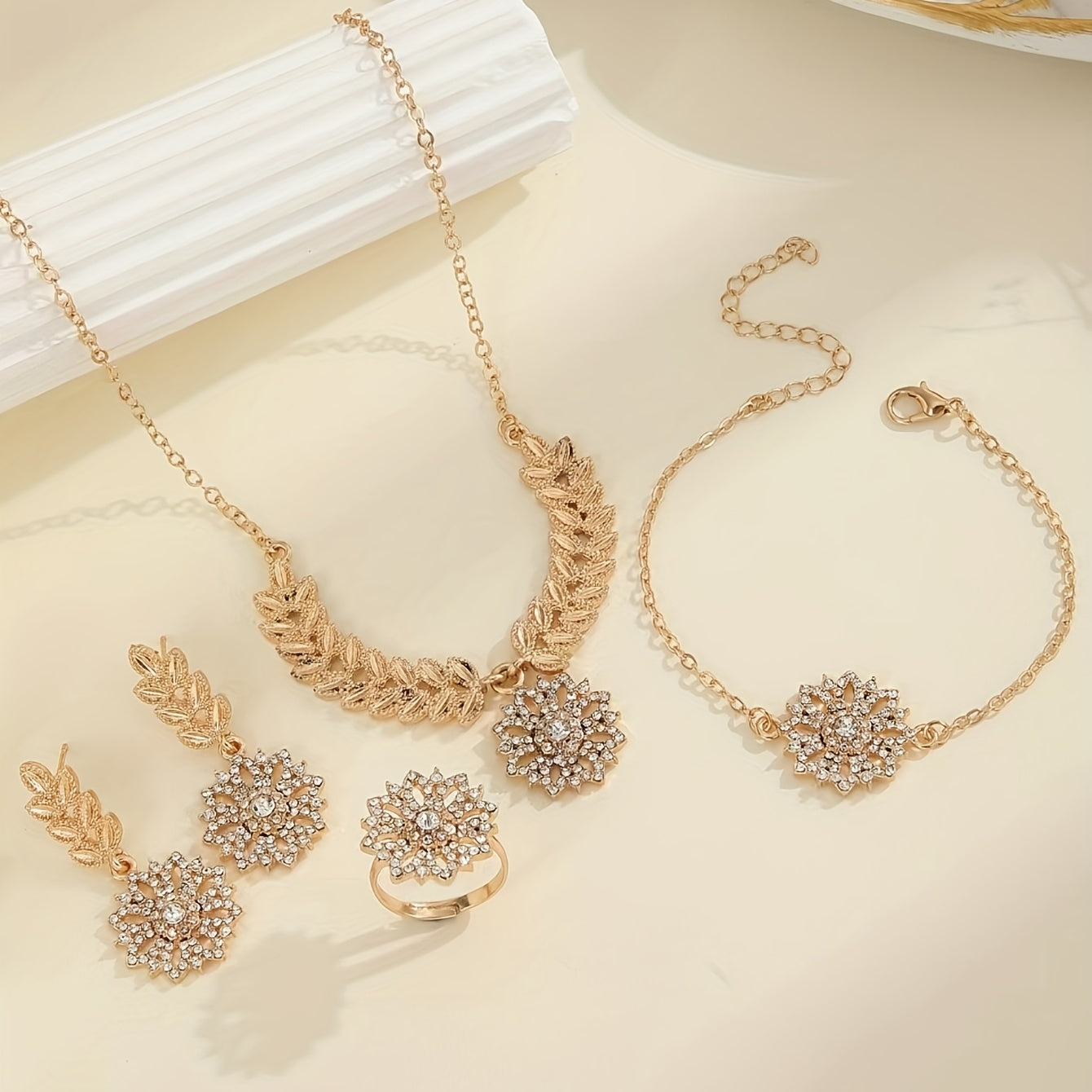 Set of 5 Bohemian Floral Jewelry pieces, including Vintage Rhinestone Greek Goddess Golden Leaf Earrings, Bracelet, Ring Set. Made of Zinc Alloy, this is the perfect All-Season Gift for Women.