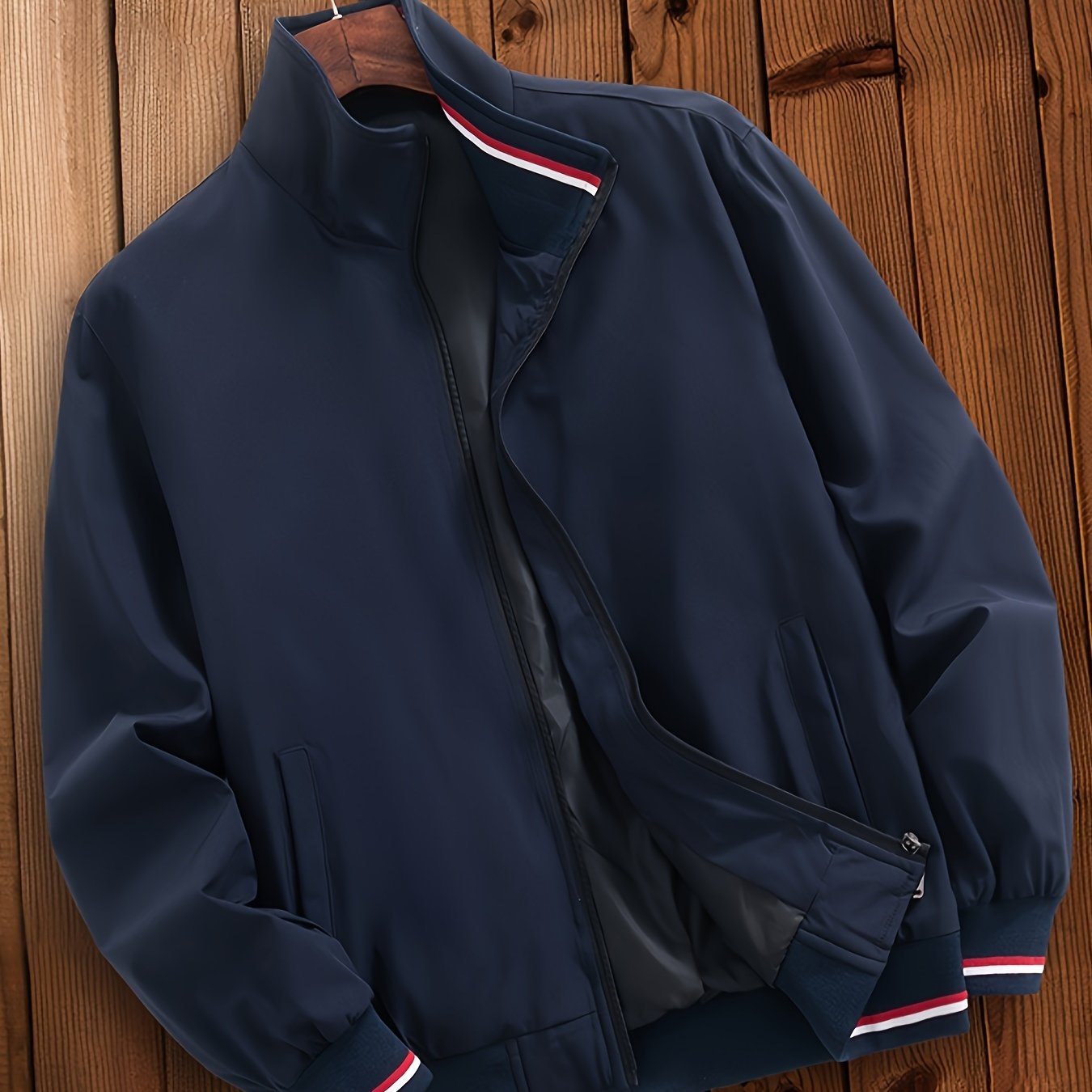 Men's casual striped jacket with pockets, stand collar, zipper closure, and long sleeves, suitable for outdoor wear.