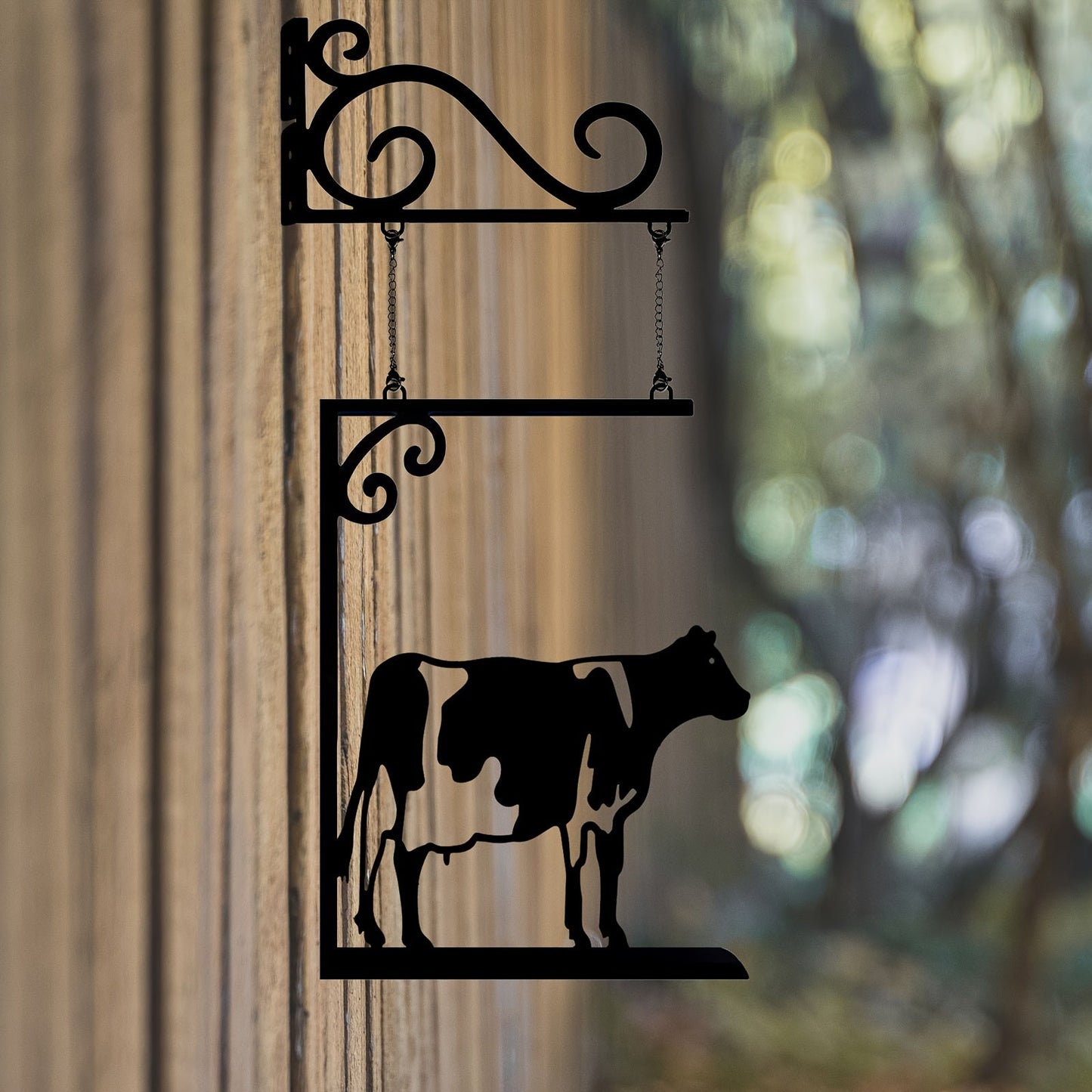 Decorate your living room, bedroom, porch, or courtyard with this unique Farm Cow Door Sign Hanging Decoration made of metal. Add a touch of creativity and charm to your space with this whimsical cow wall decoration.