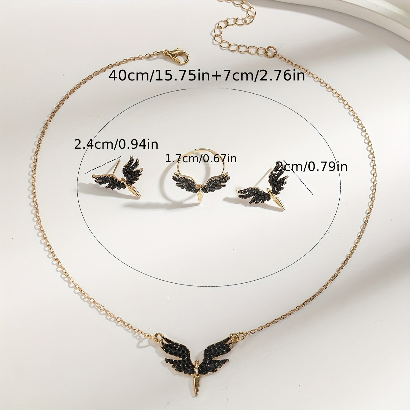 Women's Angel Wing Jewelry Set in Golden Tone with Black Accents - Includes Necklace, Earrings, Ring - Suitable for all occasions, great gift for Mom or friend.