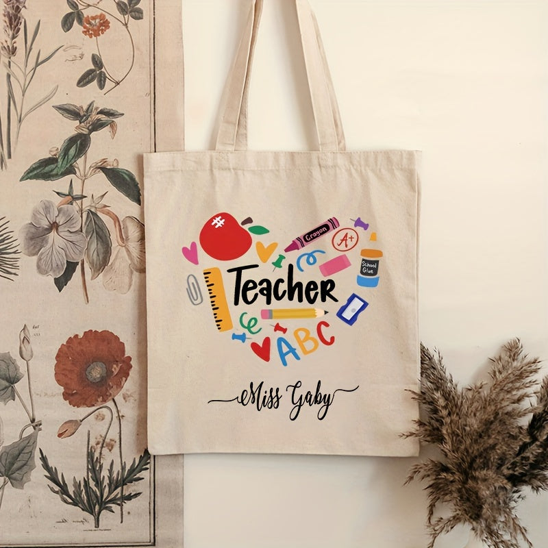 Customized shoulder bag with personalized name, featuring a lovely "Teacher Love Inspire" print on durable canvas material. The perfect back to school gift for teachers.