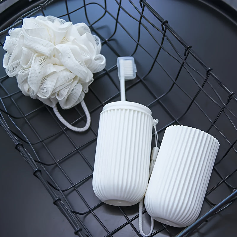 Travel toothbrush set including portable washing cup, mouthwash cup, large toothpaste tube, and storage box.