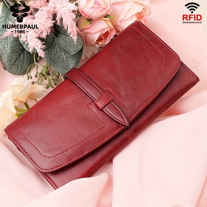 Red RFID blocking long clutch wallet with snap closure, zipper, coin pocket, and multiple card slots.