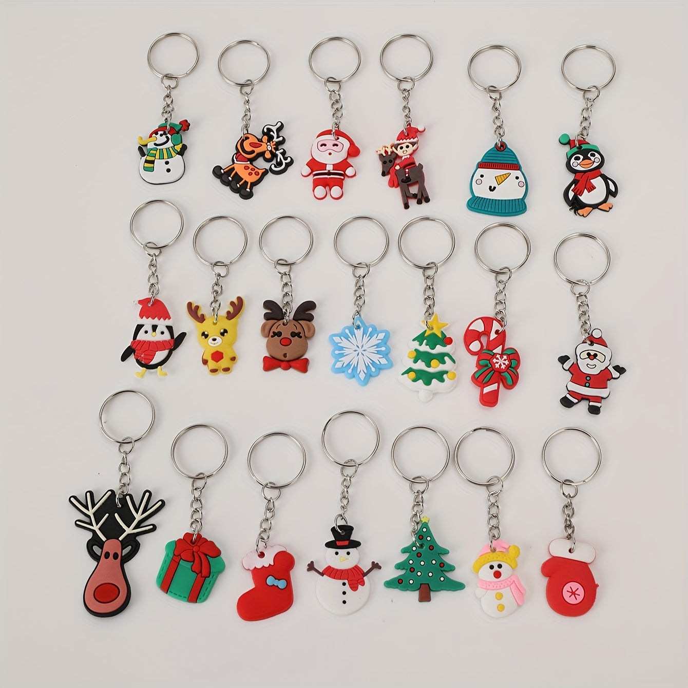 Christmas Cartoon Keychain Set includes 20 pieces - Adorable Anime and Holiday Charms for Bags, Backpacks, and Car Keys - Ideal Present for Women and Girls.