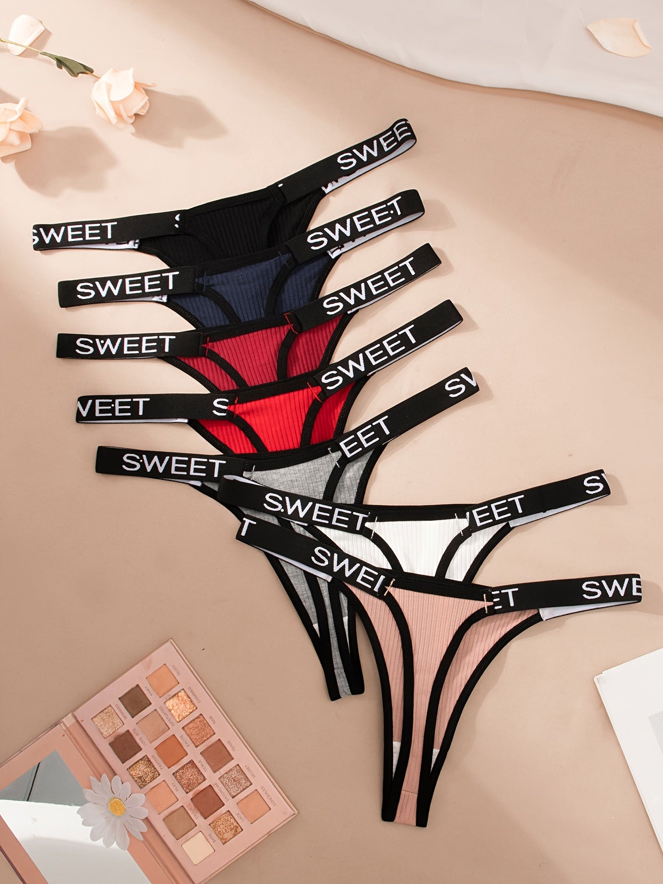 7pcs Letter Tape Contrast Binding Thongs: Sexy, comfortable, and stretchy intimates for women.