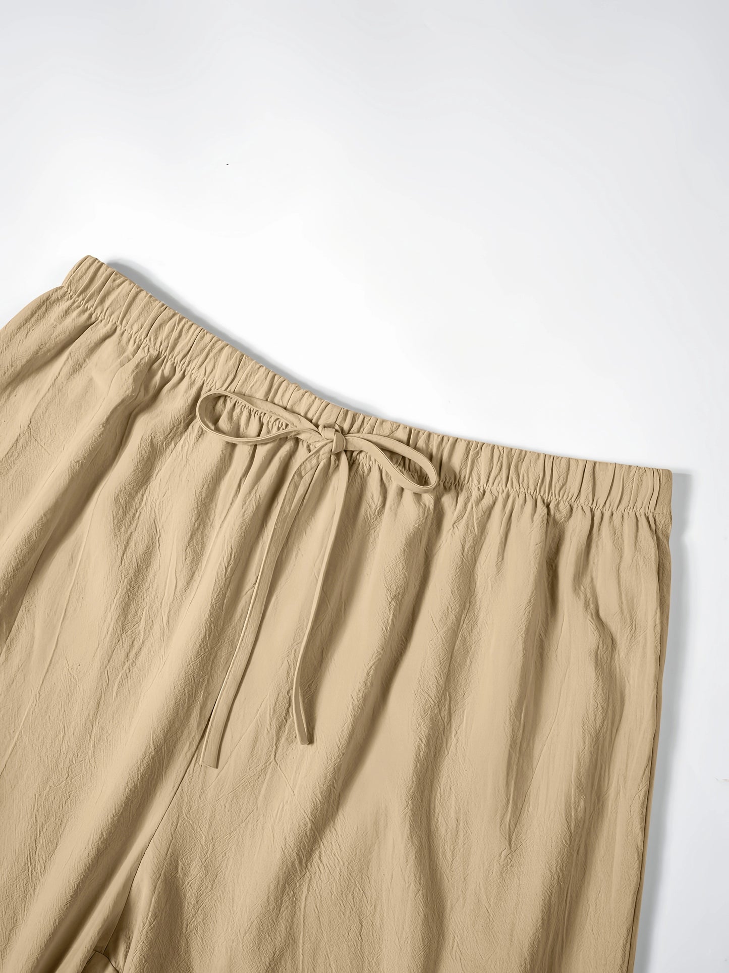 Polyester non-stretch shorts for plus size women with faux drawstring, straight fit, and suitable for all seasons.