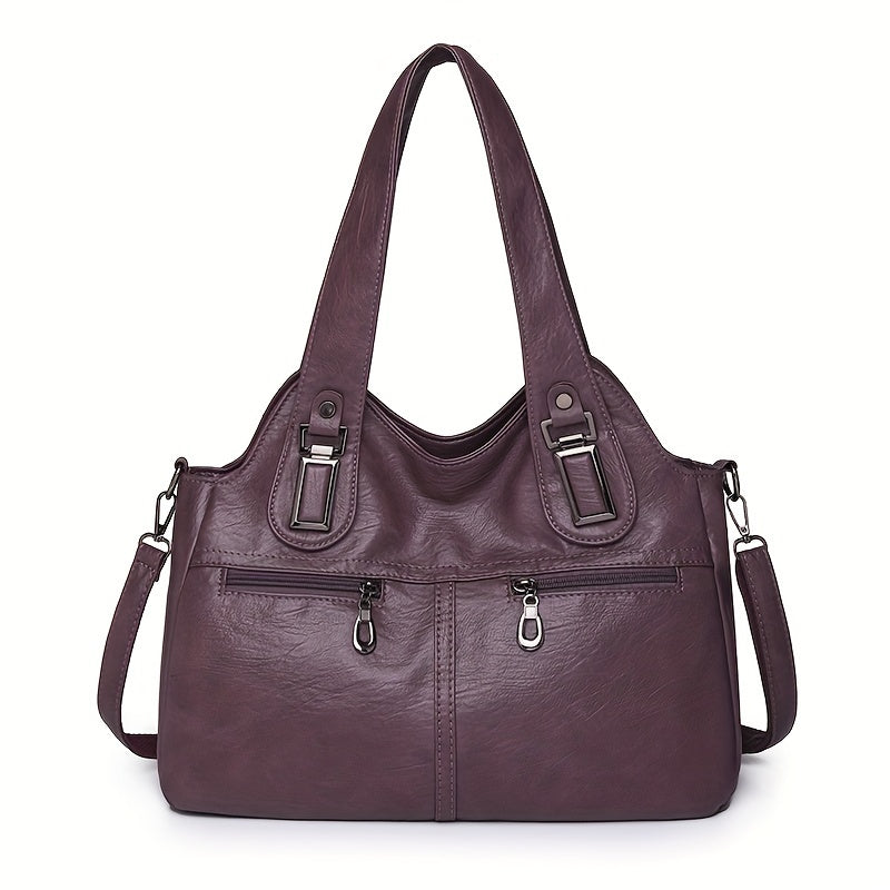 Stylish women's crossbody bag with multiple pockets, detachable strap, chic design, zip closure, and polyester lining.