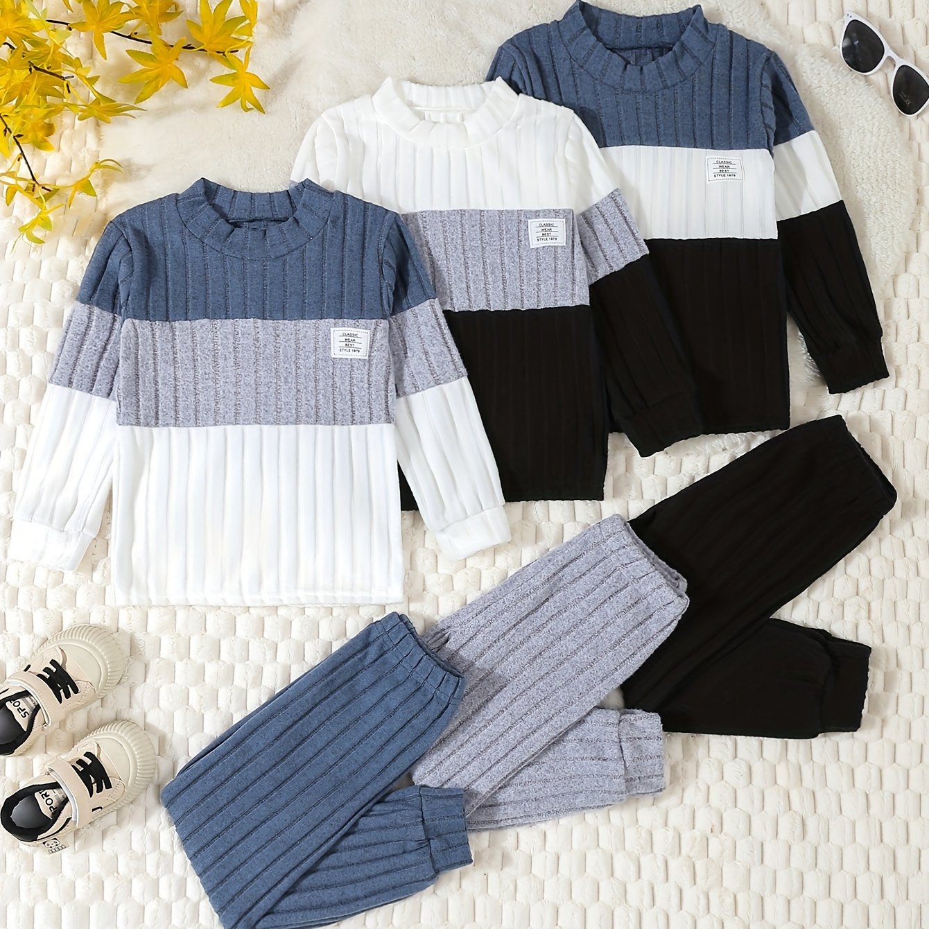 3-piece boys' color block ribbed knit outfit in blue/white/black with soft, stretchy long sleeve tops and casual pants. Machine washable for everyday comfort. Perfect for outdoor activities.