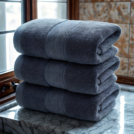 3 premium cotton velvet towels, 35.56cm x 73.66cm, soft & absorbent, hotel quality in dark blue, light beige, and gray. Ideal for bathroom or spa use.