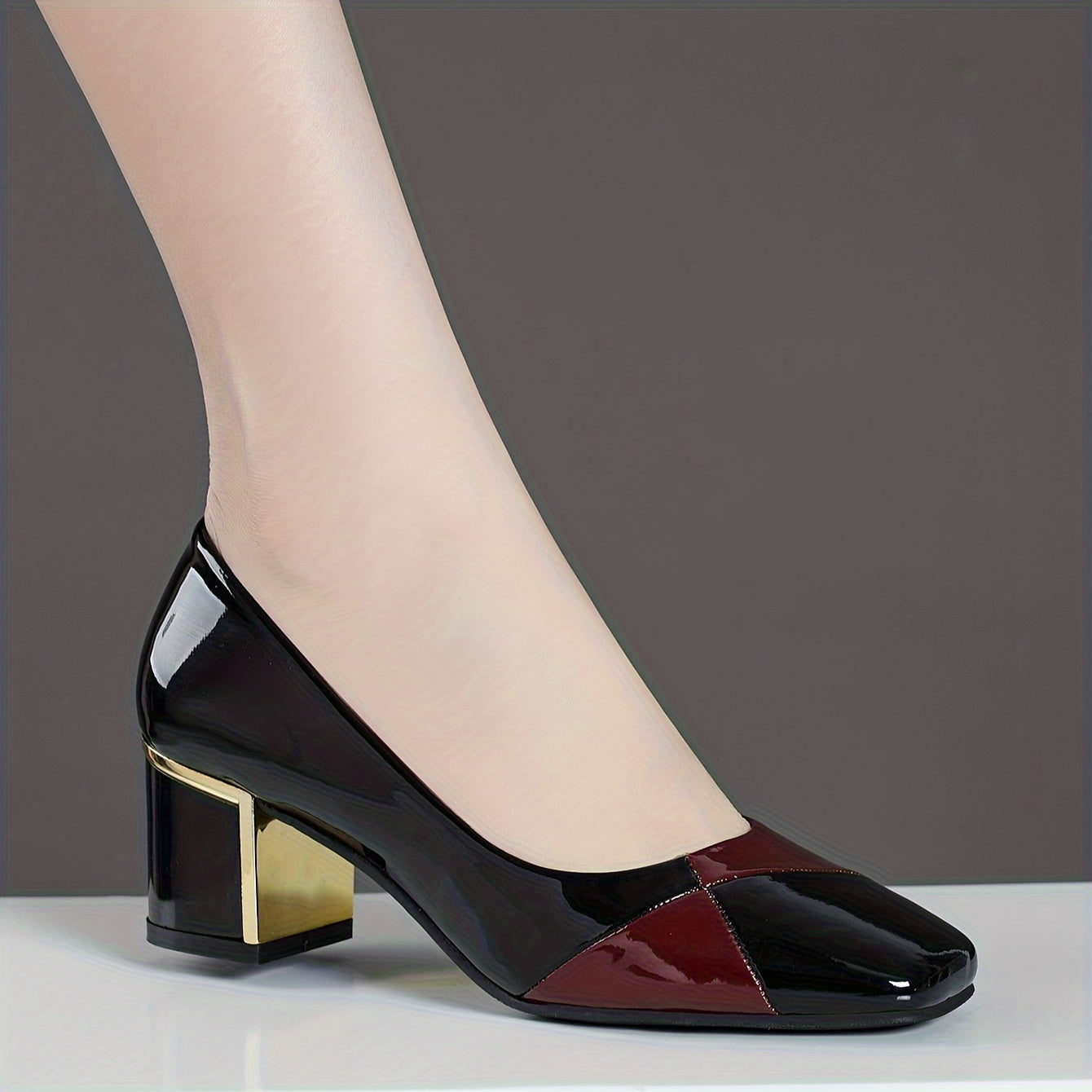 Womens chunky heels with contrasting colors and square toe design, slip-on style for fashion lovers.