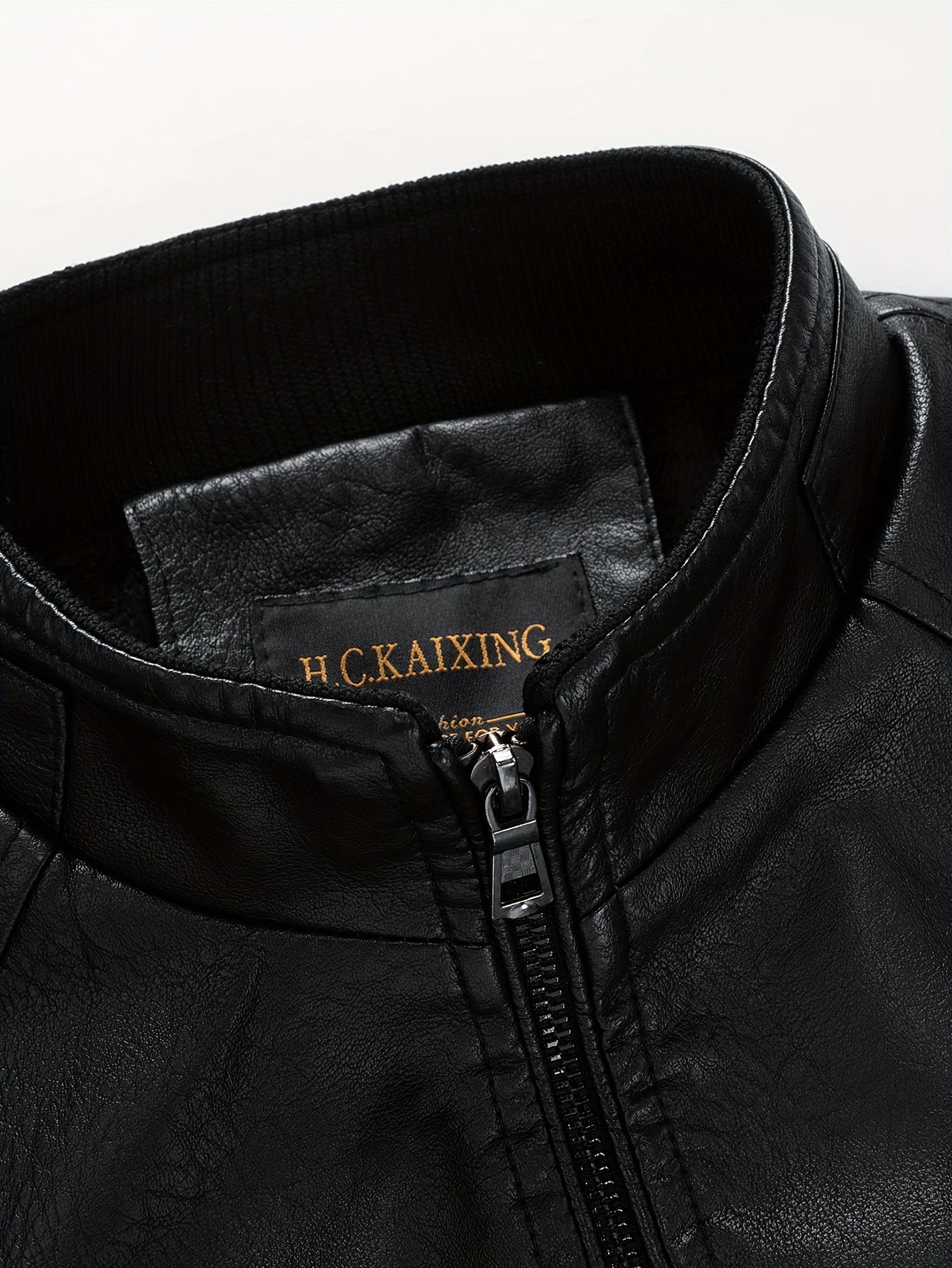 Men's Black PU Leather Jacket with Zip-Up, Multiple Pockets, Glossy Finish; Great for Casual Wear & Outdoor Activities.