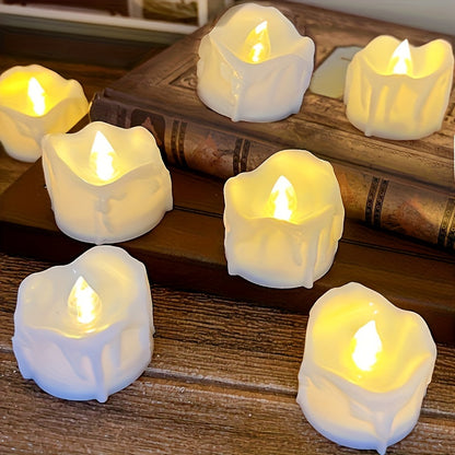 4 battery operated LED tea light candles in warm white for Christmas decoration.