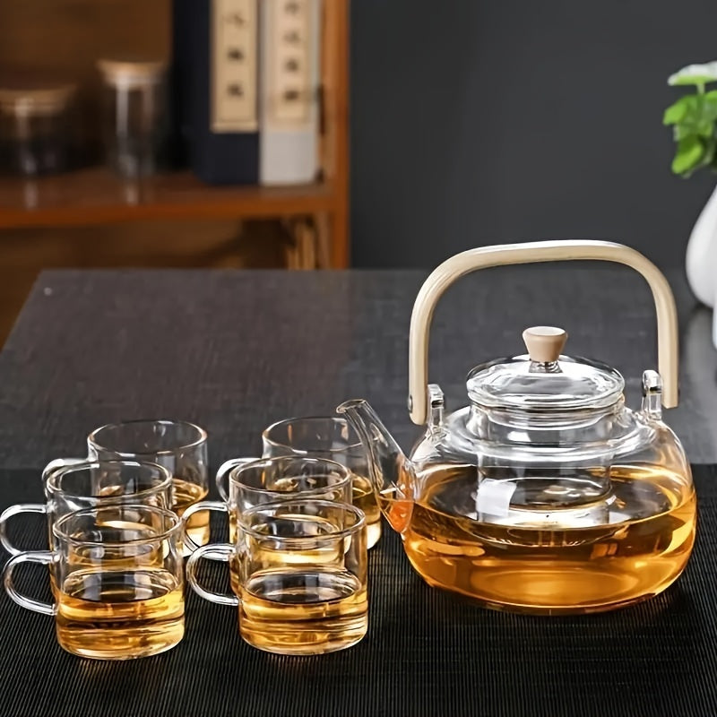 Glass teapot with bamboo handle and removable infuser, 34oz capacity. Made of heat-resistant clear borosilicate glass. Ideal for brewing loose leaf tea.