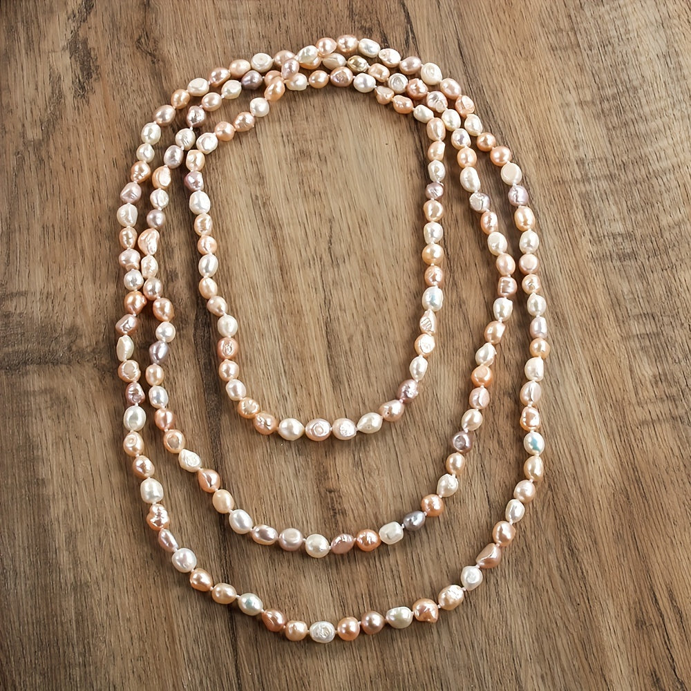 Stylish Bohemian Women's Freshwater Pearl Necklace, featuring Natural Irregular Beads in Orange Heart design. Ideal for both Daily Wear and Vacation. Measures 160cm in length with a charming White and Purple Mix. Exudes French Luxury.